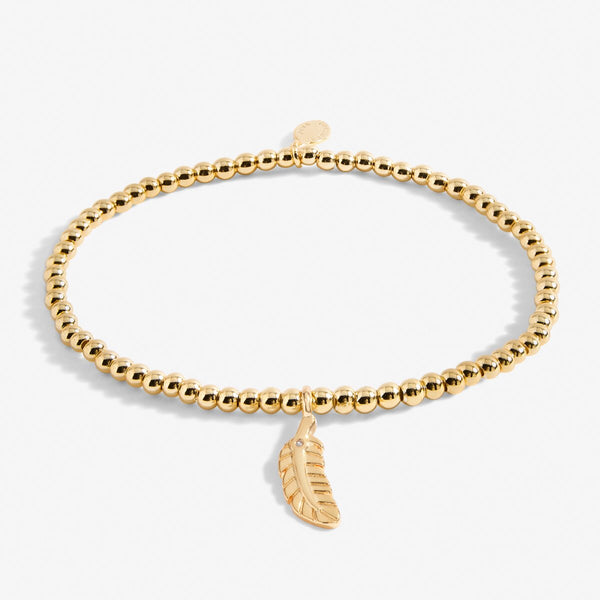 Gold plated Joma jewellery bracelet with hanging feather charm