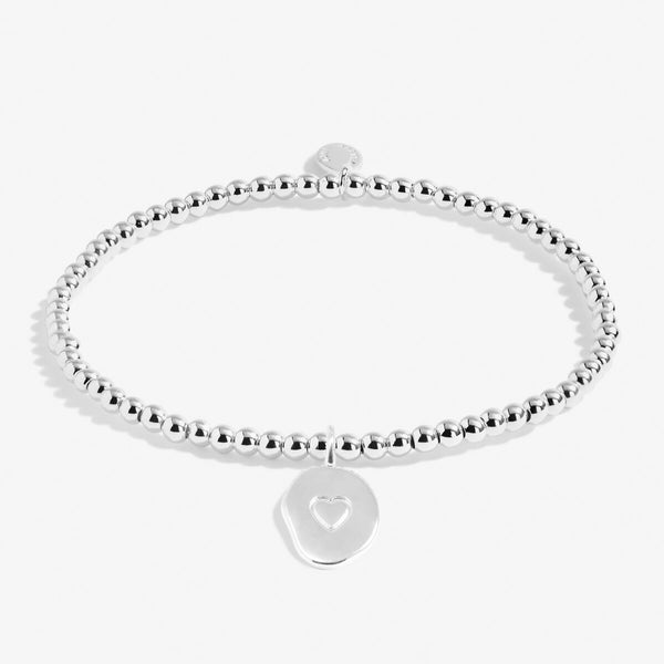 Joma beaded stretch bracelet with hanging charm