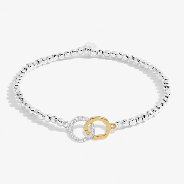 Joma beaded stretch bracelet with interlocking circle charms