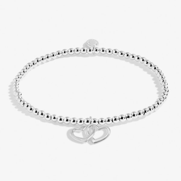 Joma classic beaded stretch bracelet with hanging heart charm