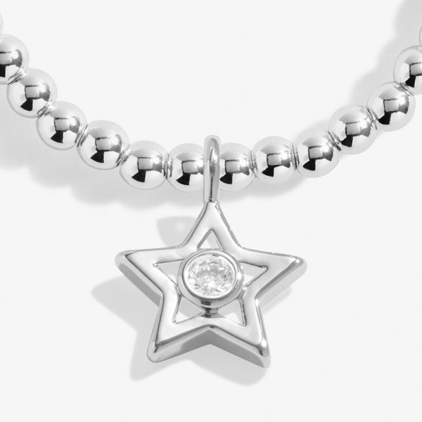 Joma jewellery silver plated beaded bracelet with hanging star charm presented on a sentiment card.