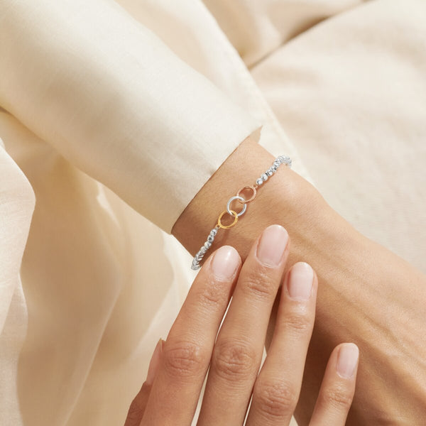 Joma Jewellery Forever Yours Family Forever Together silver beaded bracelet with three interlinked circles in silver, gold rose gold.