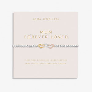 Joma Jewellery beaded bracelet with three interlinked hearts in silver, gold and rose gold presented on a blush pink sentiment card.