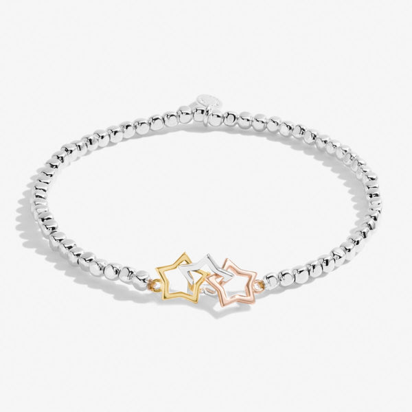 Joma Jewellery beaded stretch bracelet with three interlinked star charms in silver, gold and rose gold