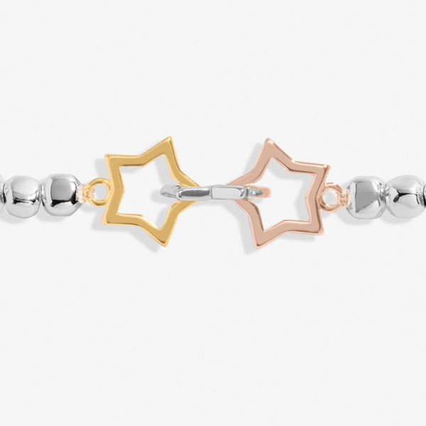 Joma Jewellery beaded stretch bracelet with three interlinked star charms in silver, gold and rose gold