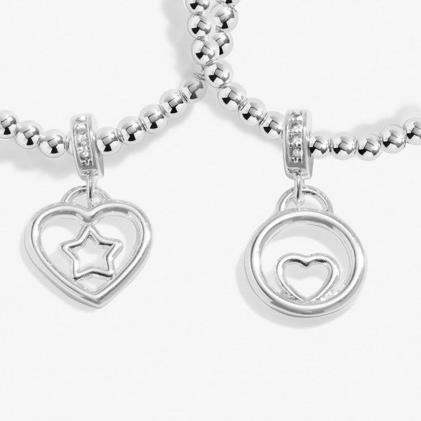 Joma jewellery Infinity Birthday bracelets with silver plated beads and open heart charm and open circle charm.