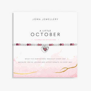 Joma Jewellery October birthstone stretch bracelet with pink semi-precious gemstones and silver hanging heart charm.