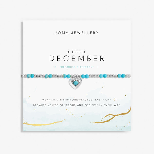 Joma Jewellery December birthstone stretch beaded bracelet featuring semi precious gemstones and a silver plated hanging heart charm.