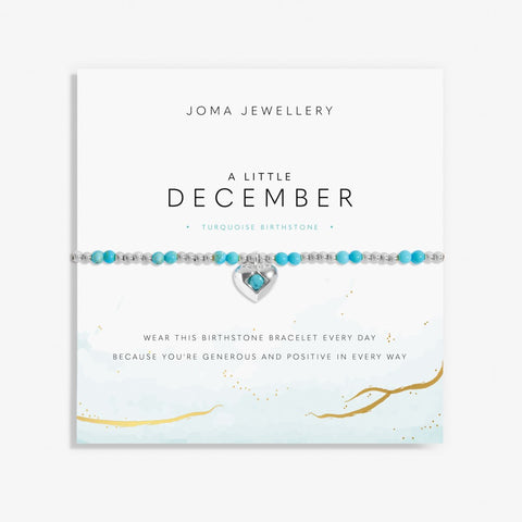 Joma Jewellery December birthstone stretch beaded bracelet featuring semi precious gemstones and a silver plated hanging heart charm.