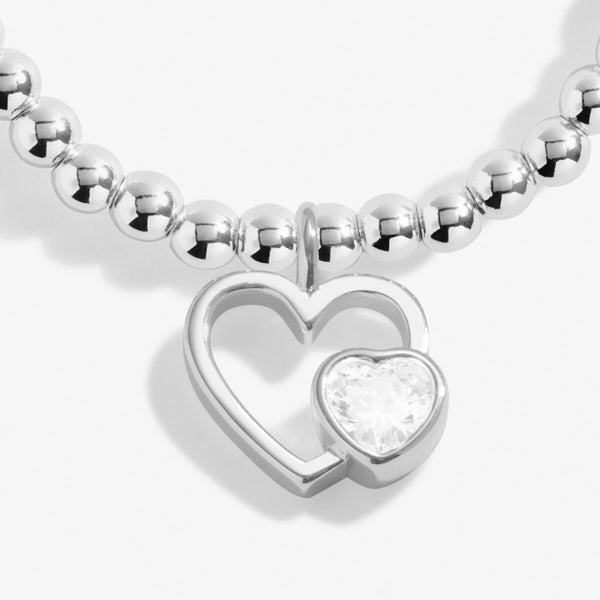 Joma Jewellery Mum bracelet with silver plated beads and an open heart charm with sparkle heart detail.