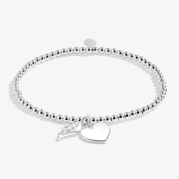 Joma jewellery silver plated beaded bracelet with heart and angel wing charms.