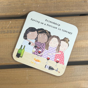 Corked back coaster featuring 4 friends having a good time in the Rosie signature style