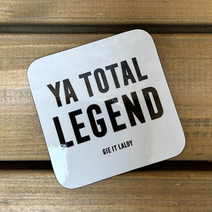 White gloss coaster with black wording Ya Total Legend