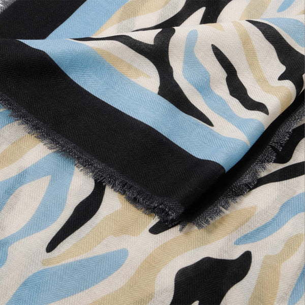 Katie Loxton abstract zebra printed scarf in ecru and blue with stylish frayed edges and lightweight fabric.