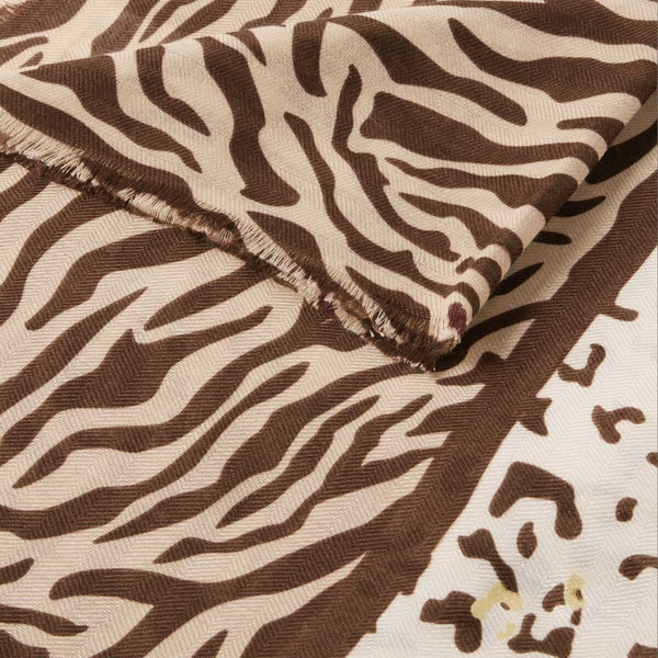 Katie Loxton foil animal printed scarf in chocolate and ecru with stylish frayed edges.